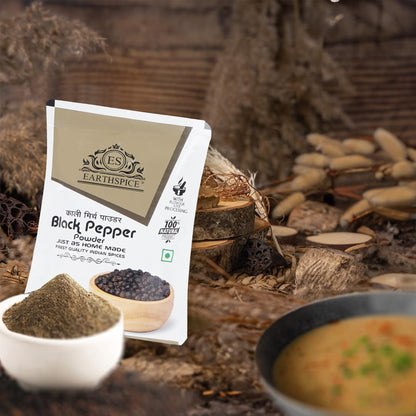 Earthspice black pepper powder packaging with black pepper and a dish.