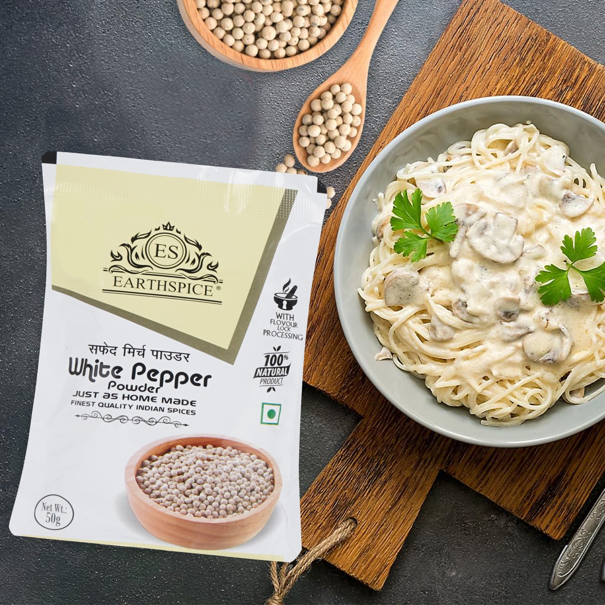 Earthspice white pepper powder package with pasta dish.