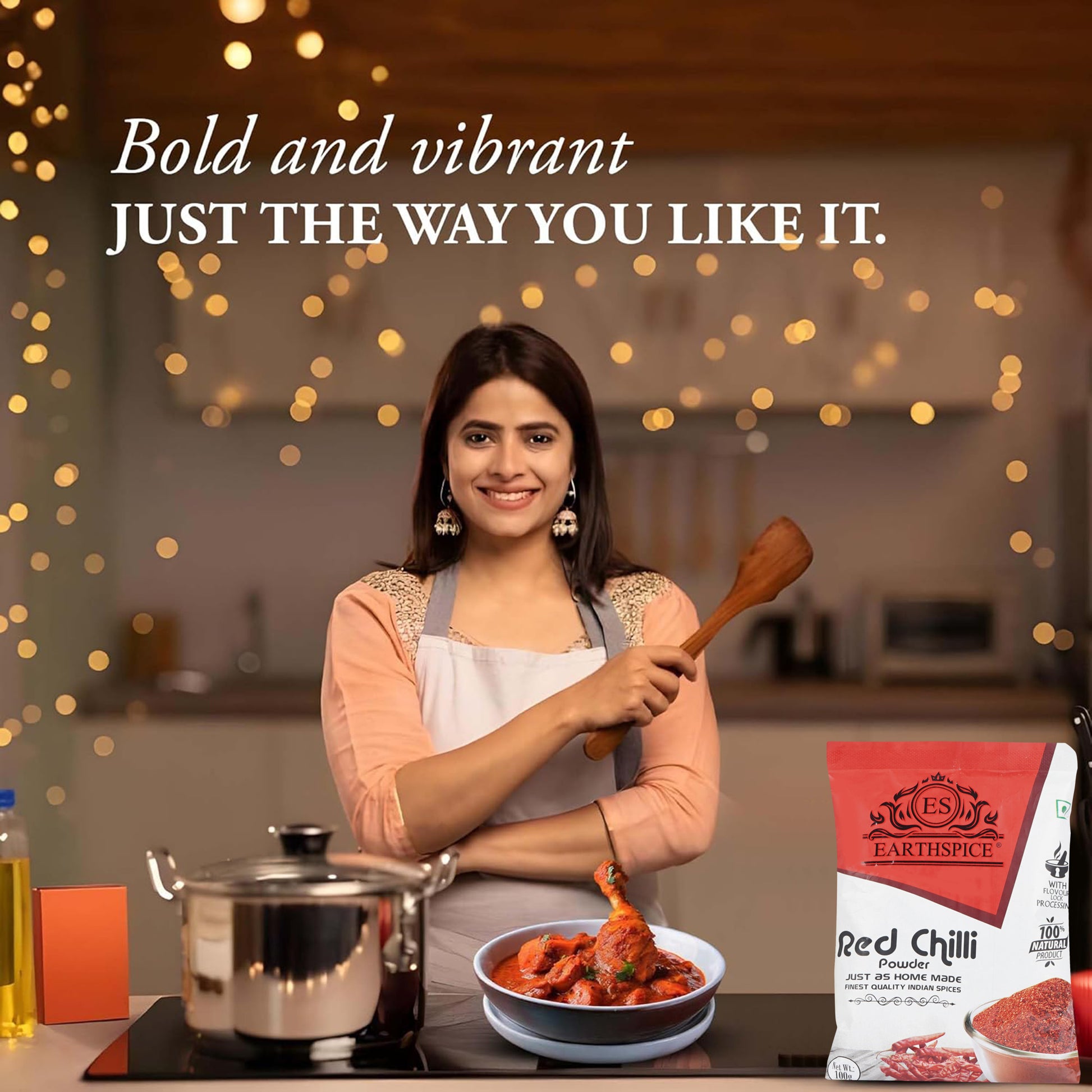 Woman in a kitchen with Earthspice red chili powder.