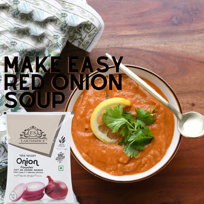 Earthspice onion powder soup with a lemon wedge and parsley.