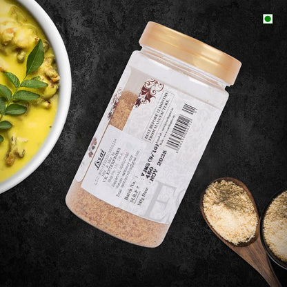 Earthspice hing asafoetida with label on a dark surface.