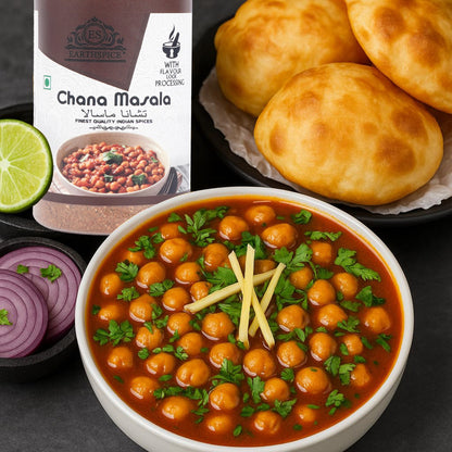 Earthspice Chana Masala with naan bread, lime, and onion.