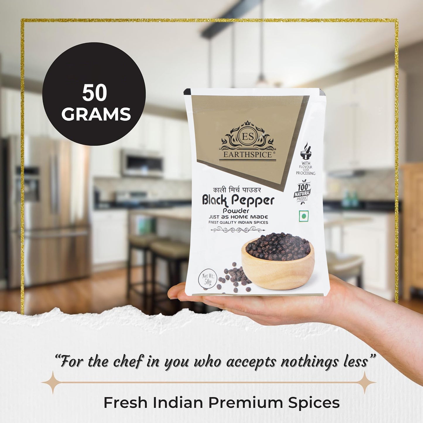 Hand holding a package of Earthspice black pepper powder.