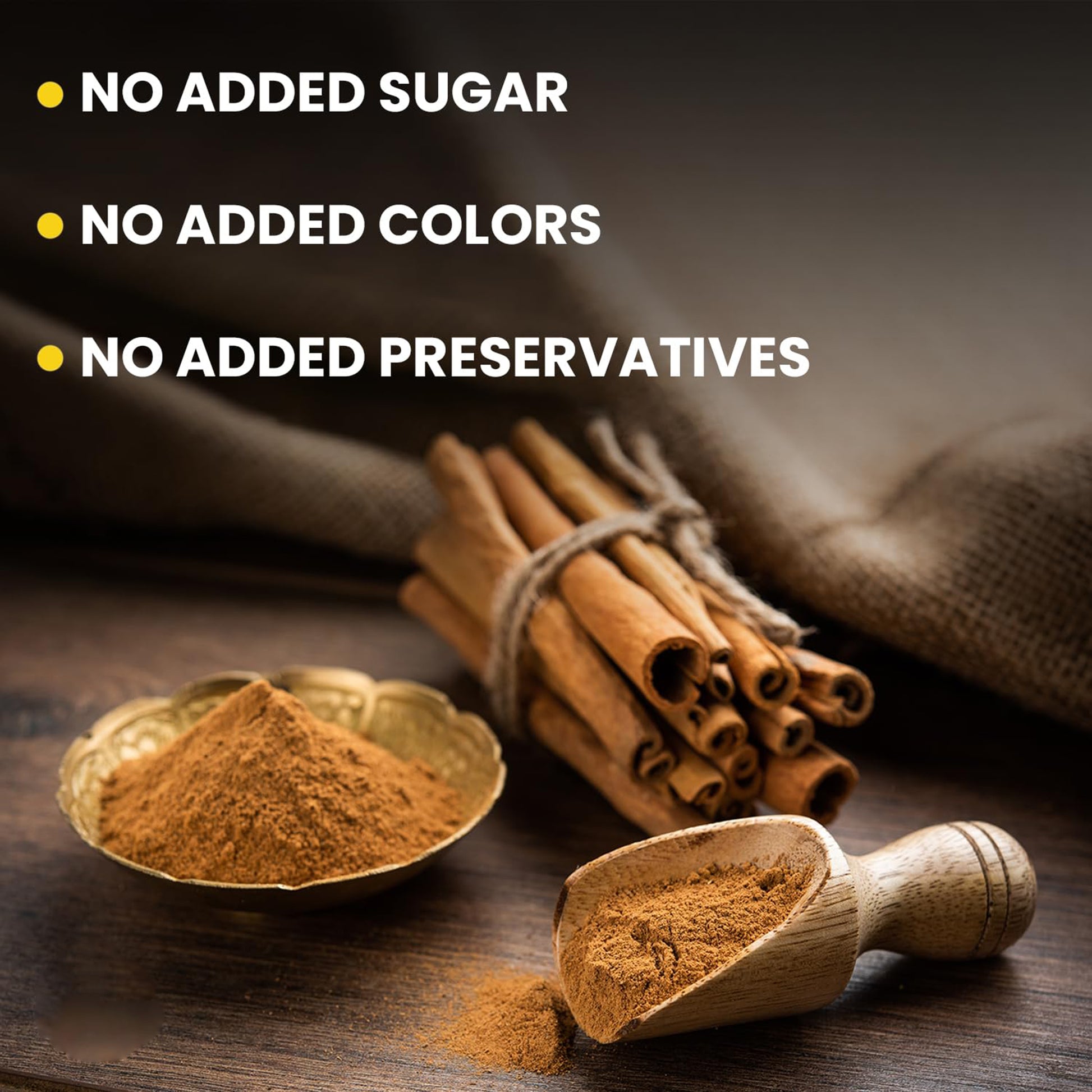 Earthspice cinnamon powder, and a wooden scoop