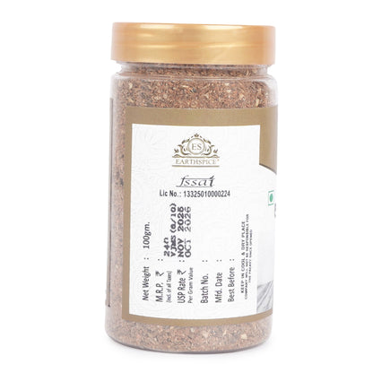 Earthspice Birayni Masala jar with a gold lid.