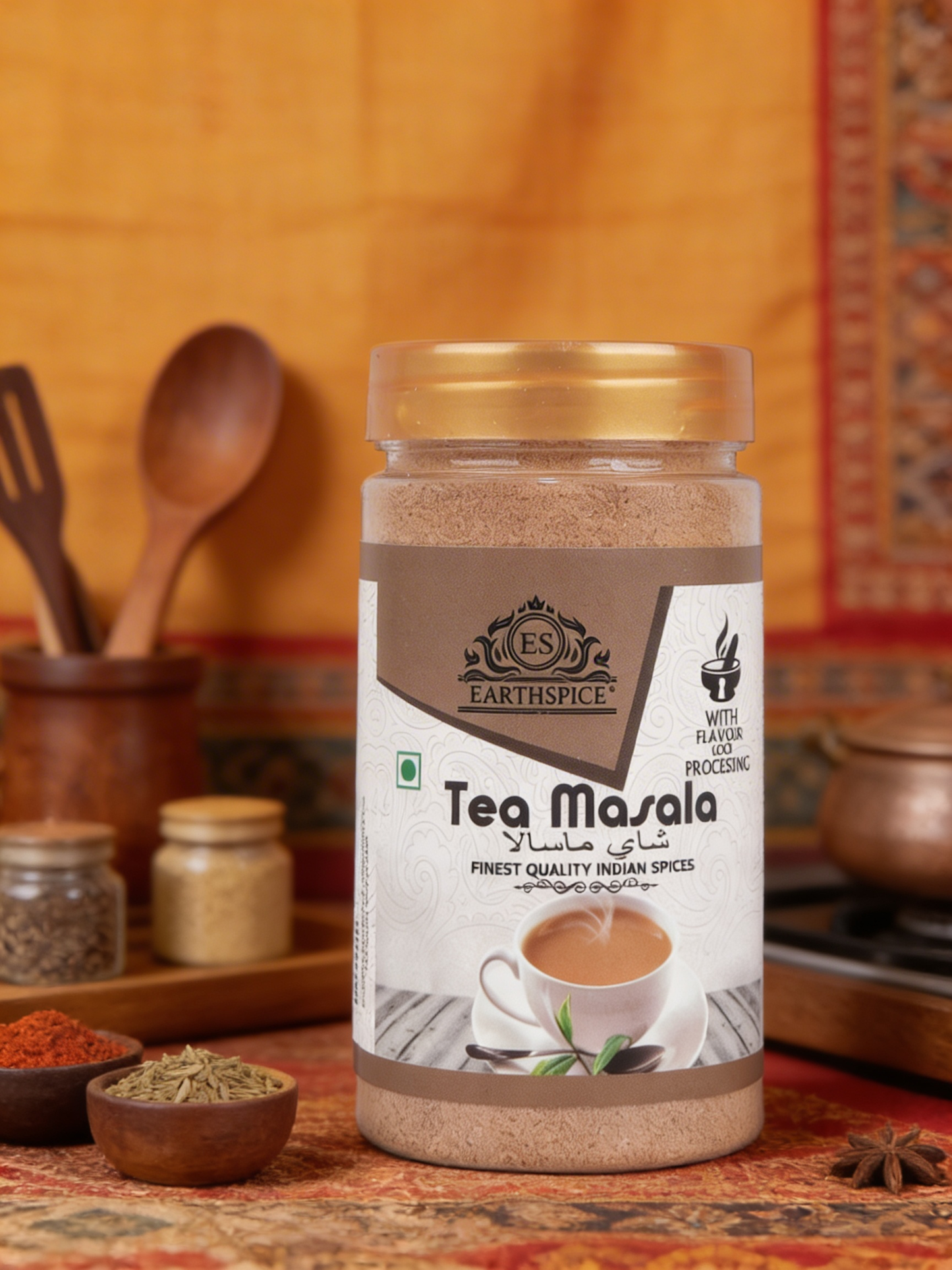 Earthspice tea masala with spices and utensils in the background